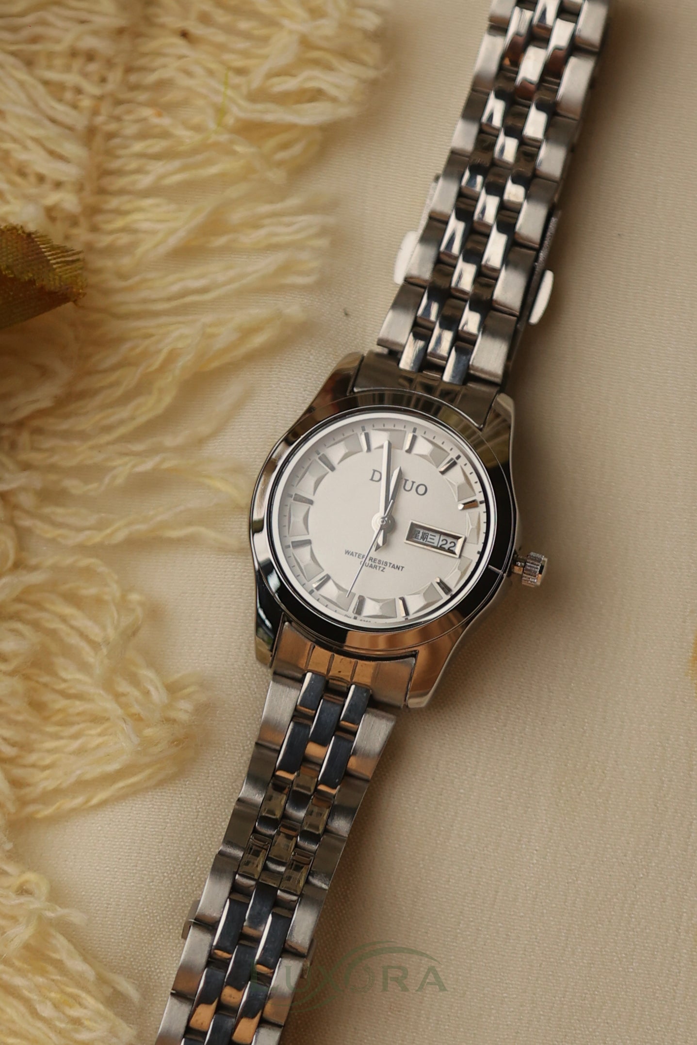 Dinuo Round Silver